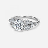 Round Cut Side Stone Engagement Ring